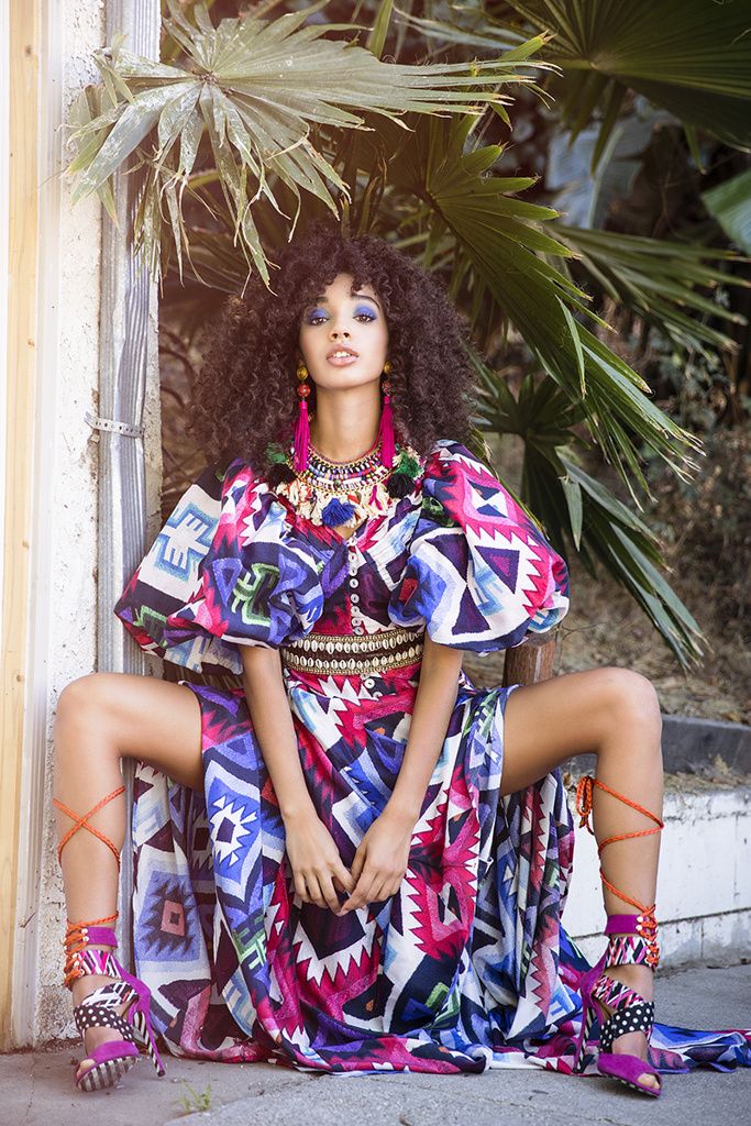 Editorial: a bold printed co-ord and laced heels against desert palms