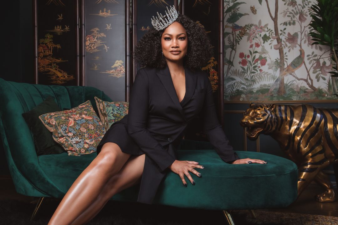 Garcelle Beauvais in a black blazer dress and crystal crown for Sheen Magazine, styled by Quentin Fears